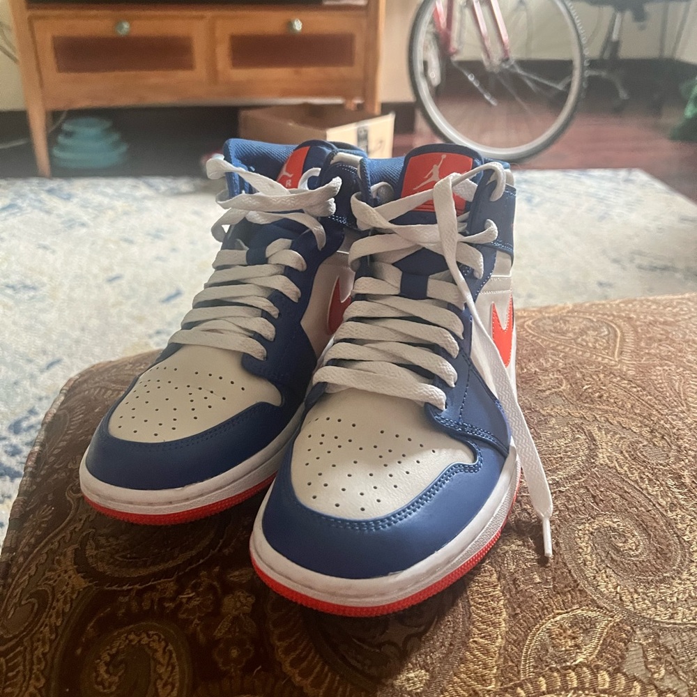 Blue and orange nike jordan 1 mid